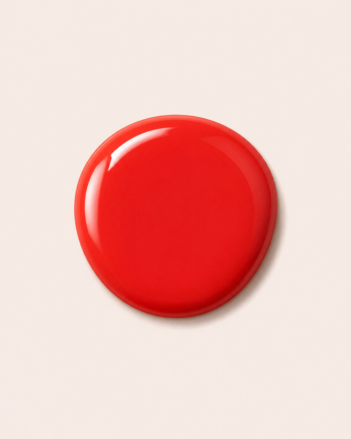 Glossy red round nail polish cap