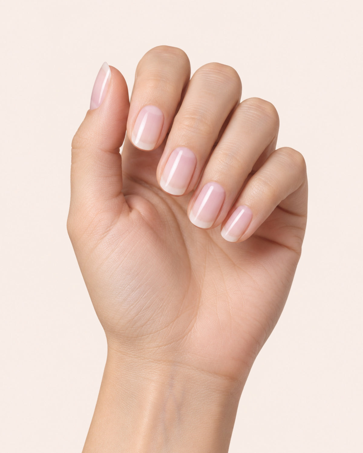 Mayvee nail polish in 'Pilates Then Prosecco' sheer ballet pink nail colour on fair skin tone