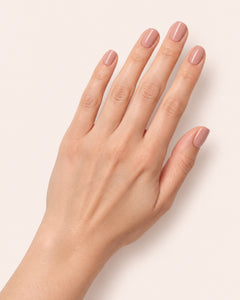 Mayvee nail polish in 'Barely Balanced' soft pink creme nail colour on fair skin tone hand