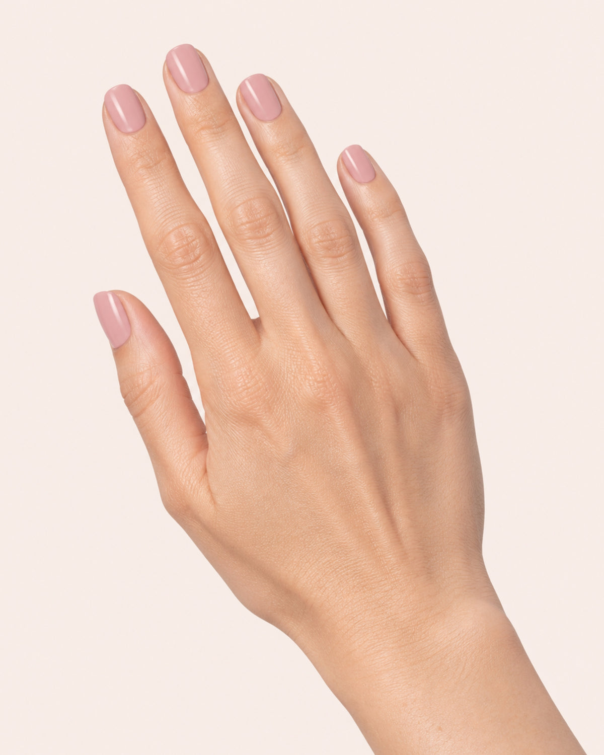 Mayvee nail polish in let them talk pink creme nail colour on fair skin tone