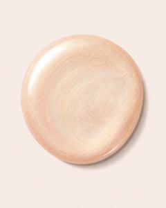 Shimmer peach-gold nail polish swatch, round top view