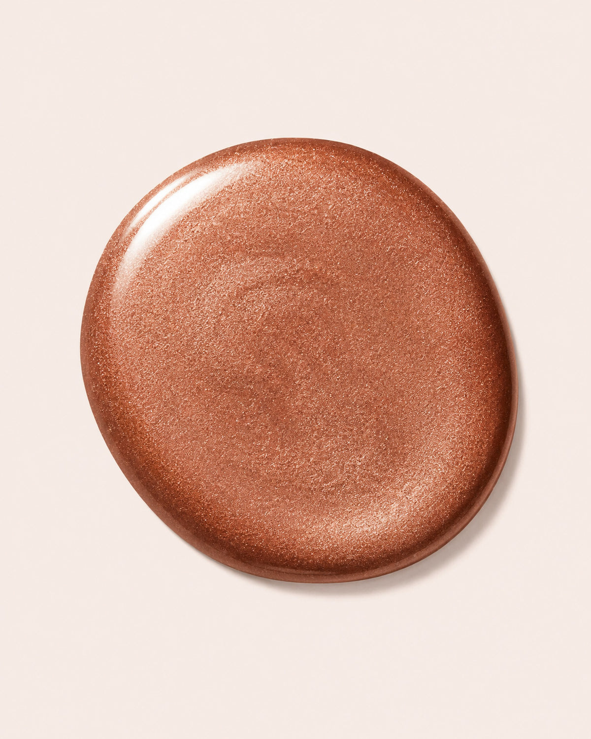 Copper metallic nail polish cap with glittery shimmer