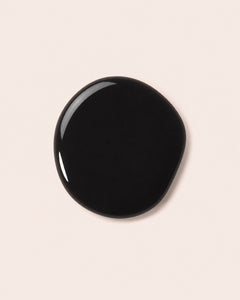 Black nail polish bottle cap, round glossy top