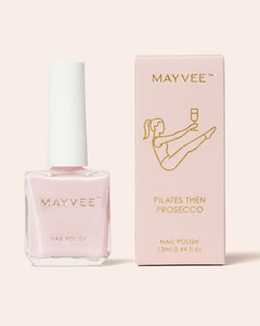 Pink nail polish bottle with MAYVEE “Pilates Then Prosecco” box