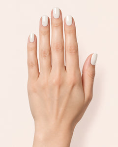 Mayvee nail polish in 'Oat Milk Oracle' eggshell white creme nail colour on fair skin tone