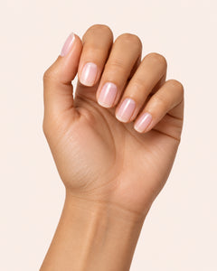 Mayvee nail polish in 'Pilates Then Prosecco' sheer ballet pink nail colour on medium skin tone