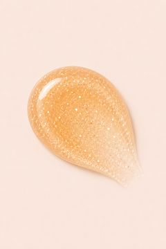 Peach-gold glitter cuticle oil swatch teardrop